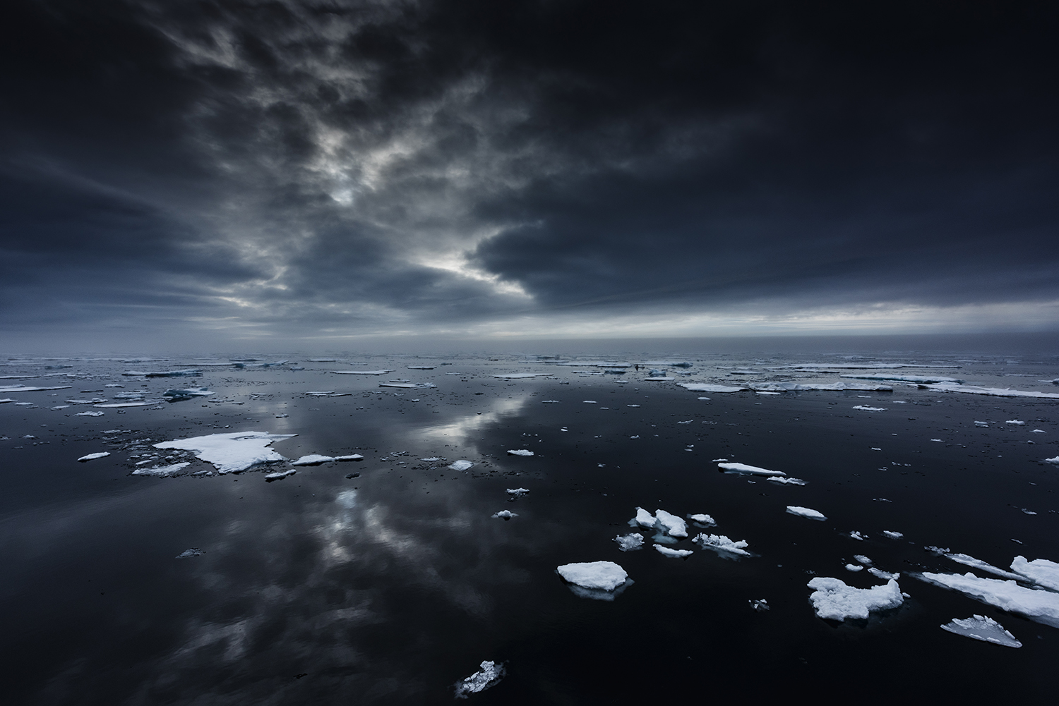 The extent of the Arctic pack ice, Greenland Sea, Northeast Coast of Greenland. Temperatures rise faster in the Arctic than anywhere else, and while scientists are warning of the mounting risks of climate change, oil companies regards the decline of sea ice as a new business opportunity.
