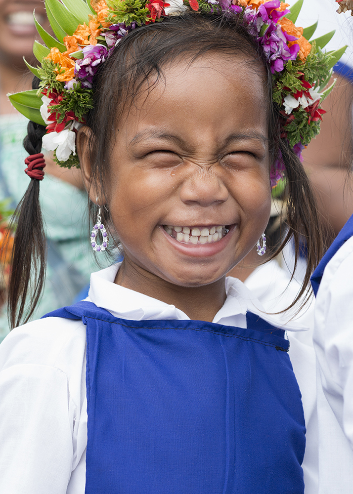 Tarawa Island, Kiribati, Pacific Ocean Kids dressed in traditional clothing, celebrating the independence day on Tarawa Island, Kiribati. The nation is considered one of the least developed and poorest countries in the world with people whose livelihoods depend on the fish. Since the arrival of foreign fishing vessels in Kiribati waters the catches for the local fishermen has been reduced.